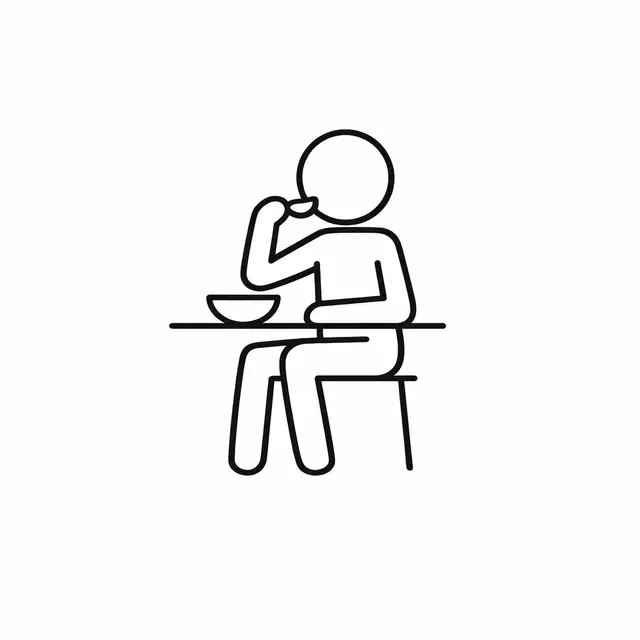 Person Eating at a Table