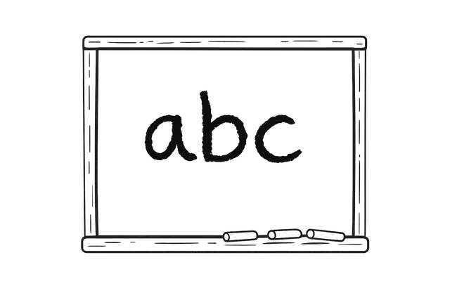 Blackboard with ABC and Chalk
